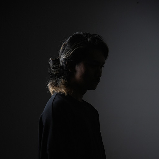 Amir Syauqi - Professional Stylist at Clipper Studio Taman Melawati with 4+ years experience specializing in Skin Fades, Burst Fades, Mullets, Two-Block Cuts, Hair Coloring, Chemical Treatments